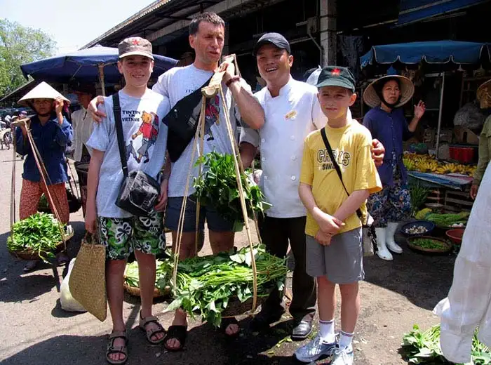 Family visiting market in Hoi An, Vietnam