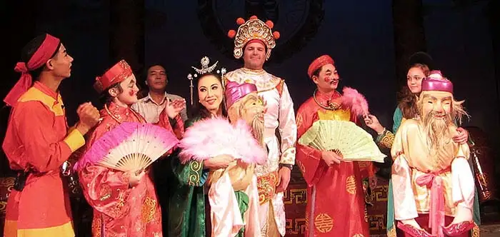 Family tour of traditional opera house in Hanoi, Vietnam