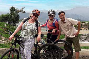 Cycling tour riders in Mai Chau, Vietnam