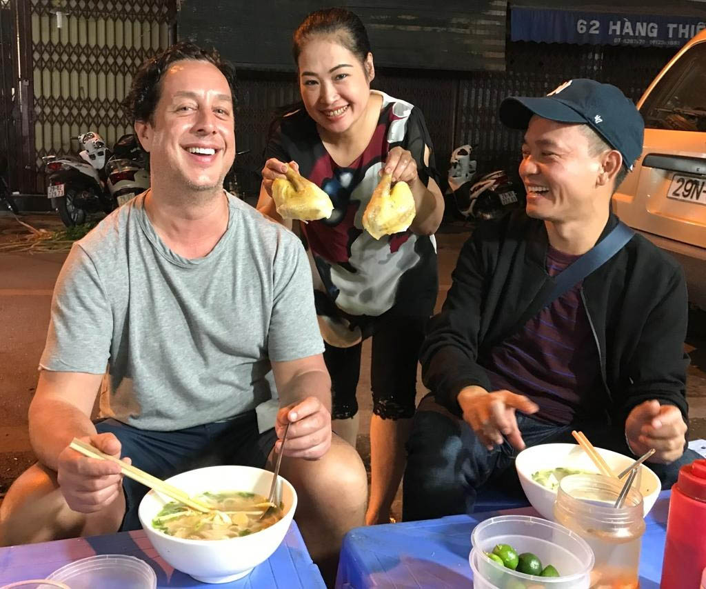 Canh eating Pho in Hanoi